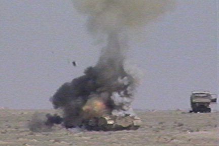 Picture of a unknown tank being blown up.